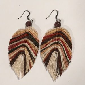 Earth tone feather earrings.